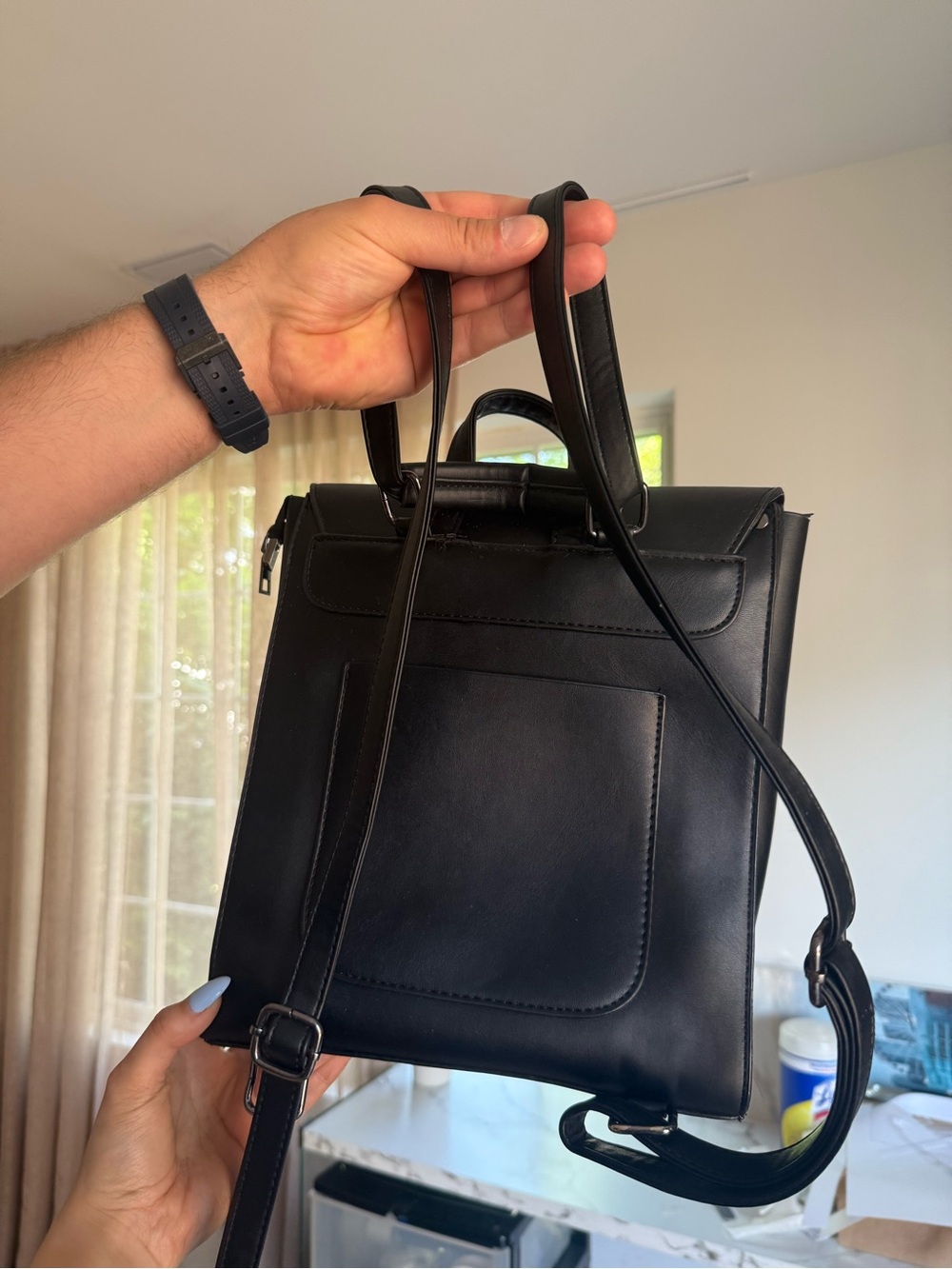 Minimalist Black Backpack with Circular Ring Detail - Picture 2 of 4
